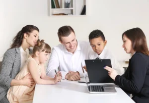 Attorney including children in a family estate planning meeting.